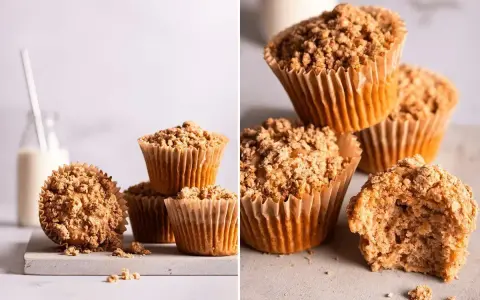 Saftige Apfelmus Muffins mit knuspriger Streuselhaube, daneben ein Glas Milch. Perfekt für den Nachmittagskaffee.